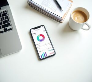 Smartphone showing expense tracking app with receipt scanning feature